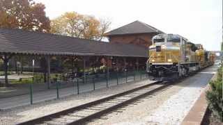 preview picture of video 'EMDX 1201 backs CAT train past River Station Peoria, IL'