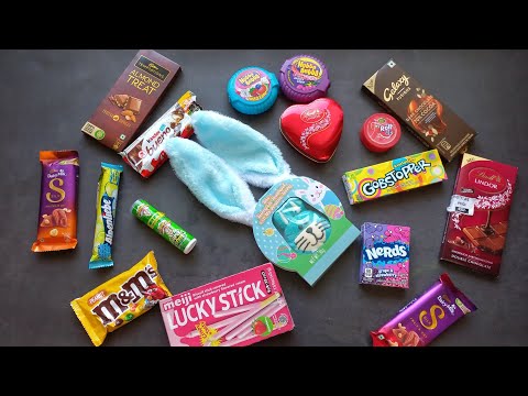 100 candies opening, chocolate a video, lots of chocolates, Cadbury celebration, surprise toys