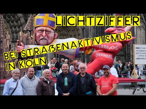 Dom, Woelki und Aktivisten - vor dem Kölner Dom. Mit Statements von David Farago und Jens Windel.
