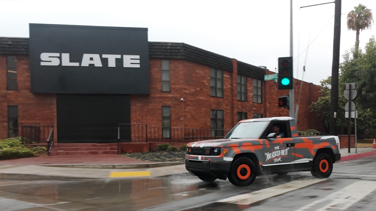 Slate electric pickup truck on a cross-country road trip