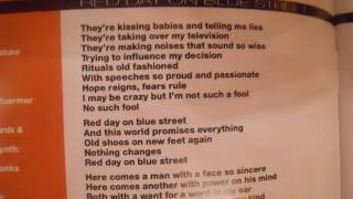 Red day on blue street - Tony Banks