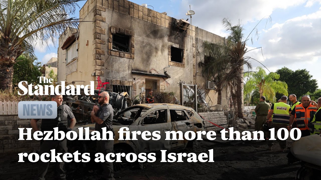 Hezbollah fires more than 100 rockets across Israel as fears of war mount
