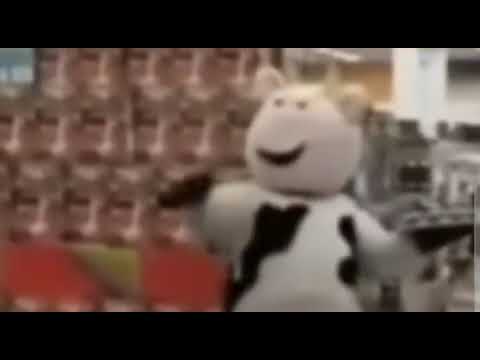guy jumps on chill face cow in mall