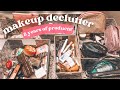 THROWING OUT 8 YEARS OF MAKEUP! | Decluttering and organizing my makeup collection 2023