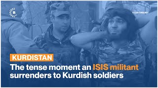 The tense moment an ISIS militant surrenders to Kurdish soldiers