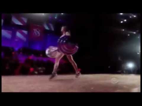 Isabeli Fontana lifting heavy weight at 2010 Victoria's Secret Fashion Show