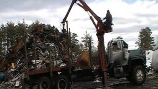 preview picture of video 'Georges UNLOADS THE LOG TRUCK AT THE JUnK YARD'