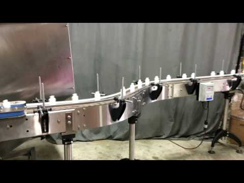 Automatic Bottle Unscramble Model Trusort-48 with 35 cubic foot hopper and custom conveyor 45 degree