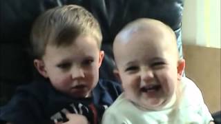 Little boy bites his brother finger (Funny)