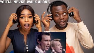 OUR FIRST TIME HEARING RIGHTEOUS BROTHERS - YOU WILL NEVER WALK ALONE REACTION!!!😱