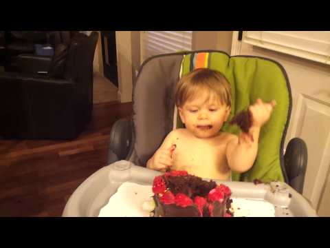 Cayden trying to wat his 1st bday cake! 2012