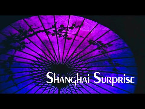 SHANGHAI SURPRISE (1986) (Clip) - Title sequence song by George Harrison  (LYRICS [CC])