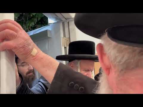 Bobov Rebbe Affixes a Mezuzah in Florida