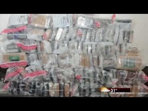 DNCD ocupa 324 paquetes de cocaína y apresa dos hombres en puerto caucedo