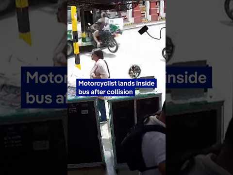 CCTV captures rider emerging from inside bus after crash | DW News