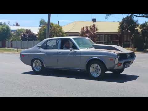 3 Cars leaving Meredith Car Show