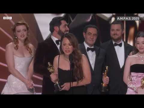 A payback kiss, a surprise win, and defying gravity at the Oscars