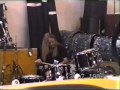 1998 Bettina Henrich tunes a drum kit