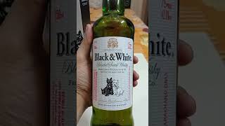 Black & White blended scotch whisky unboxing.