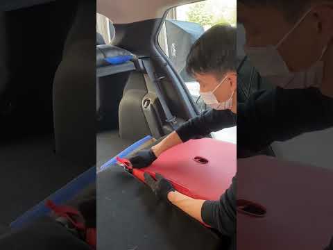custom Nissan car seat covers installation for the rear row backrest
