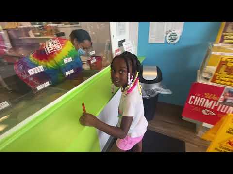 Janelle gets ice cream from KaleidoScoops