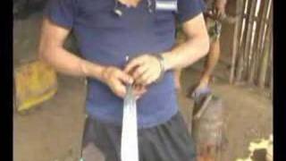 preview picture of video 'Blacksmith Making Knives in Luang Prabang'