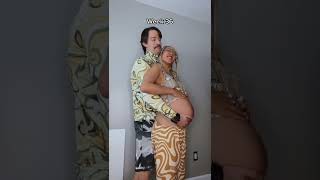 Holding up my wife&#39;s pregnant belly at week 36