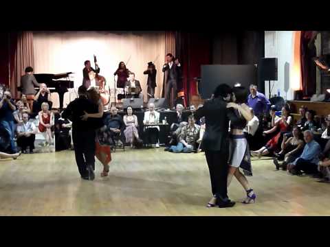  Claire da Silva,    Dario da Silva,    Alina Kolonitskaya,    and  Joel Daou  are  dancing  to  Sexteto Milonguero  at  England International Tango Festival  in  2012