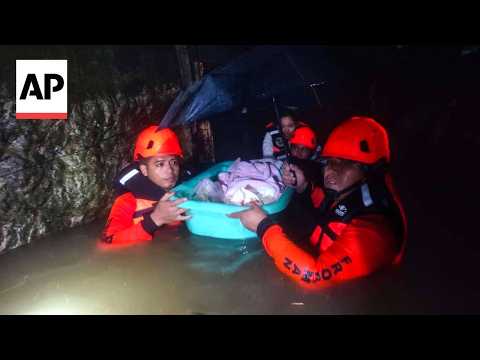 Authorities rescue residents as floods hit Cavite in the Philippines