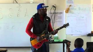 Hip-hop star Wyclef Jean freestyles at N.J. school