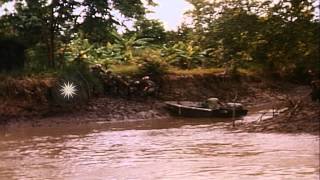 Soldiers being shuttled across a deep narrow canal by the Boston Whaler canal boa...HD Stock Footage