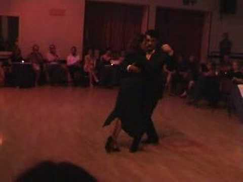  Angelica Grisoni  and  Alejandro Aquino  are  dancing  to  a  tango