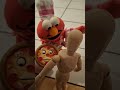 Pizza Elmo Does A Delivery