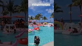 Enjoy a fun day at Virgin Voyages private beach club