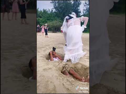 Watch this funny video of this man get stepped on while taking pictures
