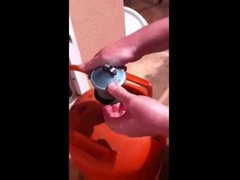 Spain changing gas canister