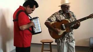Andy Cardenas and Rudy Lopez performing Las Gaviotas at the Carver Community Center