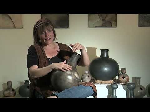 Janelle Burdell demonstrates playing the Udu drum