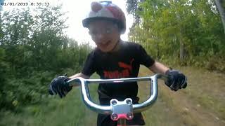 My 4 year old has started riding the singletrack with me at the reforestation camp on his tagalong.  This might be from the doubletrack section but as you can see, he loves it!  Whether it's just you or with your kids, get out and ride;)