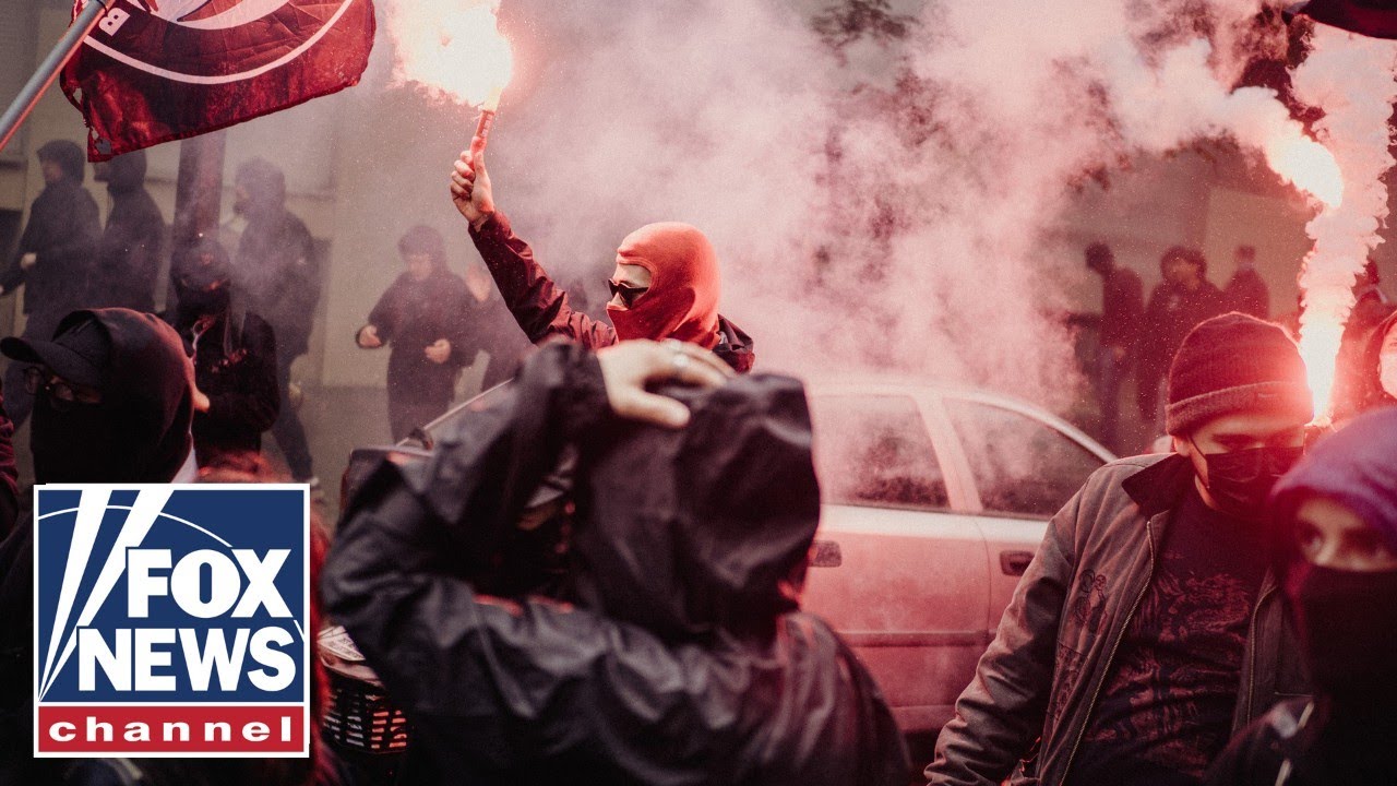 Activist SWARMED by mob SCREAMING in her face