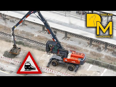 RAILWAY CONSTRUCTION ATLAS 350MHplus MATERIAL HANDLER Loading Trucks ATLAS 1404 KZW WHEEL EXCAVATOR