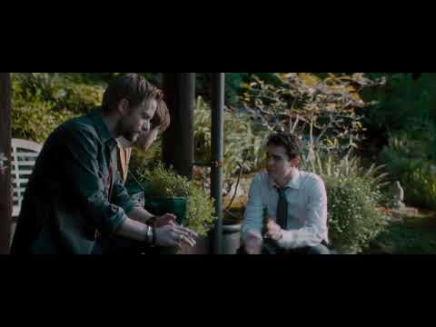 Trailer moment: bar stage lights and crowd—where diegetic songs power the plot