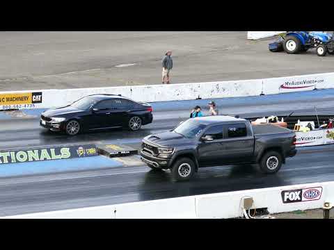 RAM 1500 TRX Truck With Supercharged 6.2L HEMI V8 Engine Drag Race Vs. BMW 5 Series (?) Sedan