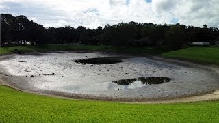 OCALA, FLORIDA RESIDENTS SHOCKED AS SINKHOLE OPENS UP SWALLOWING 5 ACRE POND TUESDAY (AUG 23, 2013)
