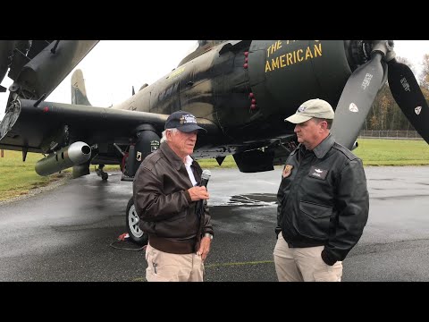 LT. COL. TOM DWELLE DISCUSSING THE DOUGLAS A-1 SKYRAIDER/SANDY, HERITAGE FLIGHT MUSEUM, SKAGIT, WA