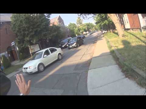 Cyclist SMIDGAF, pushy BLPX 703, streetcar 4187 runs a red