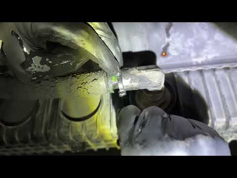 How to remove transmission oil line from radiator on Volvo vnl d13 Cummins Mack