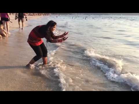Pragya playing with waves in Phuket, Thailand