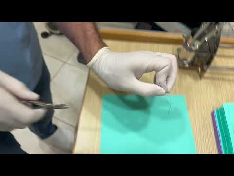 Shaping a  flat Niti wire to a reverse curve of Spee.