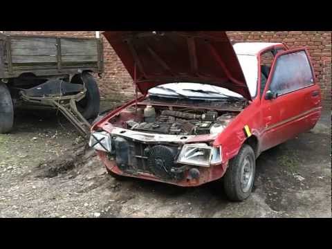 Extreme coldstart from the red Peugeot 205